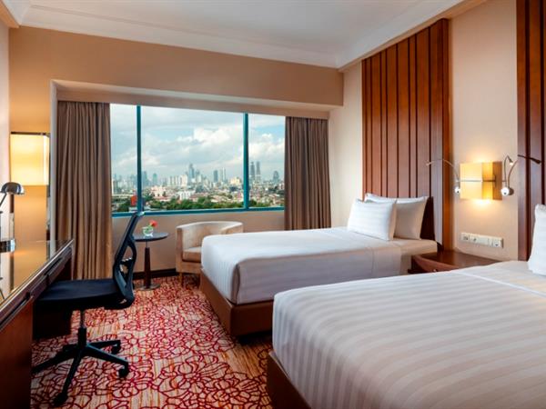 Deluxe Premium Room Twin Bed - Pengalaman Menginap Mewah di Hotel Ciputra Jakarta: Fasilitas dan Layanan Terbaik - jakartatraveller.com